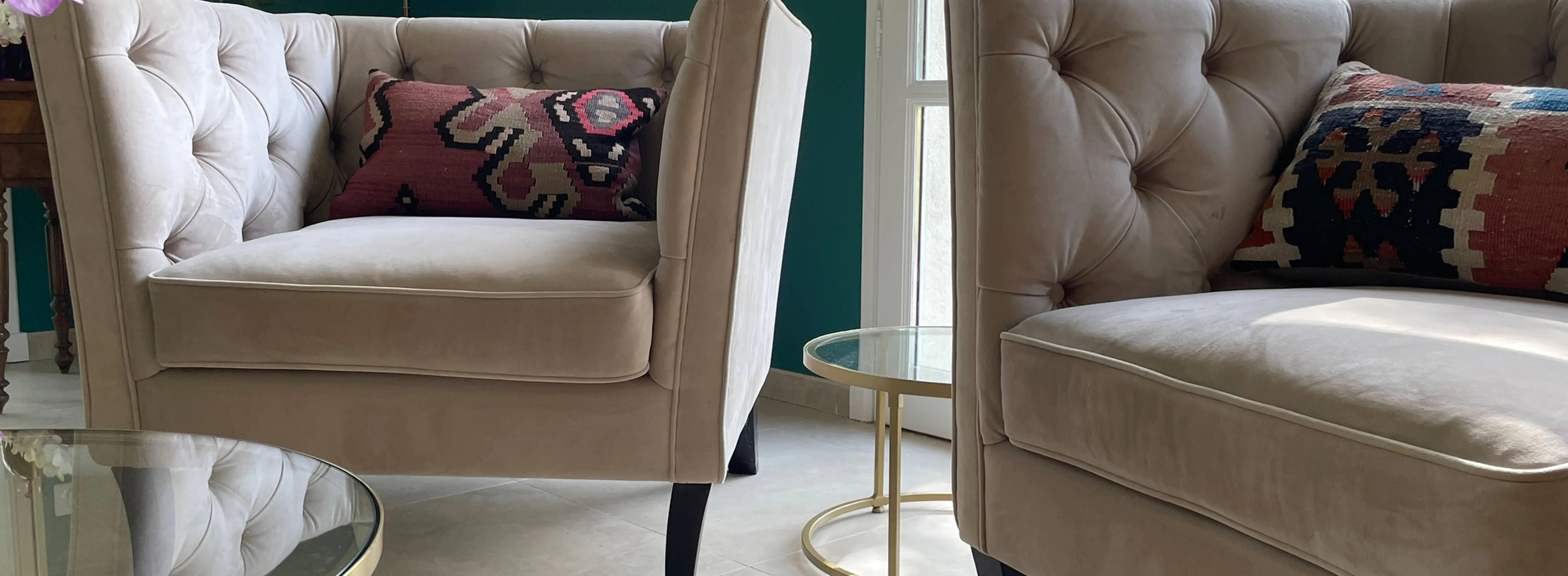 Two armchairs with cushions